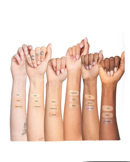 Colorescience tinted sunscreen swatches on hands of diverse skin tones, fair to rich deep, at LADA Beauty, Las Cruces